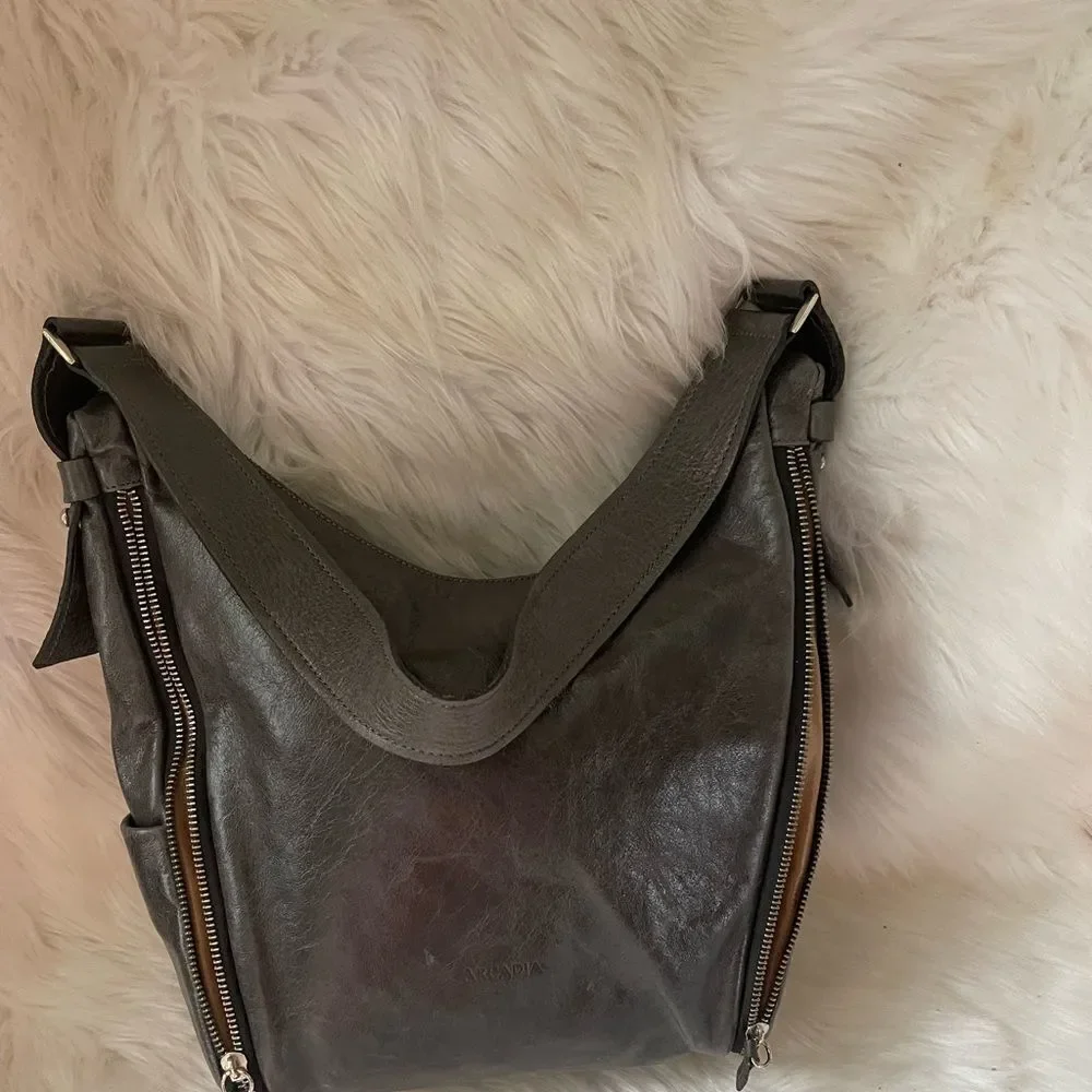 Arcadia gray Italian soft leather shoulder bag with extended silver tone…